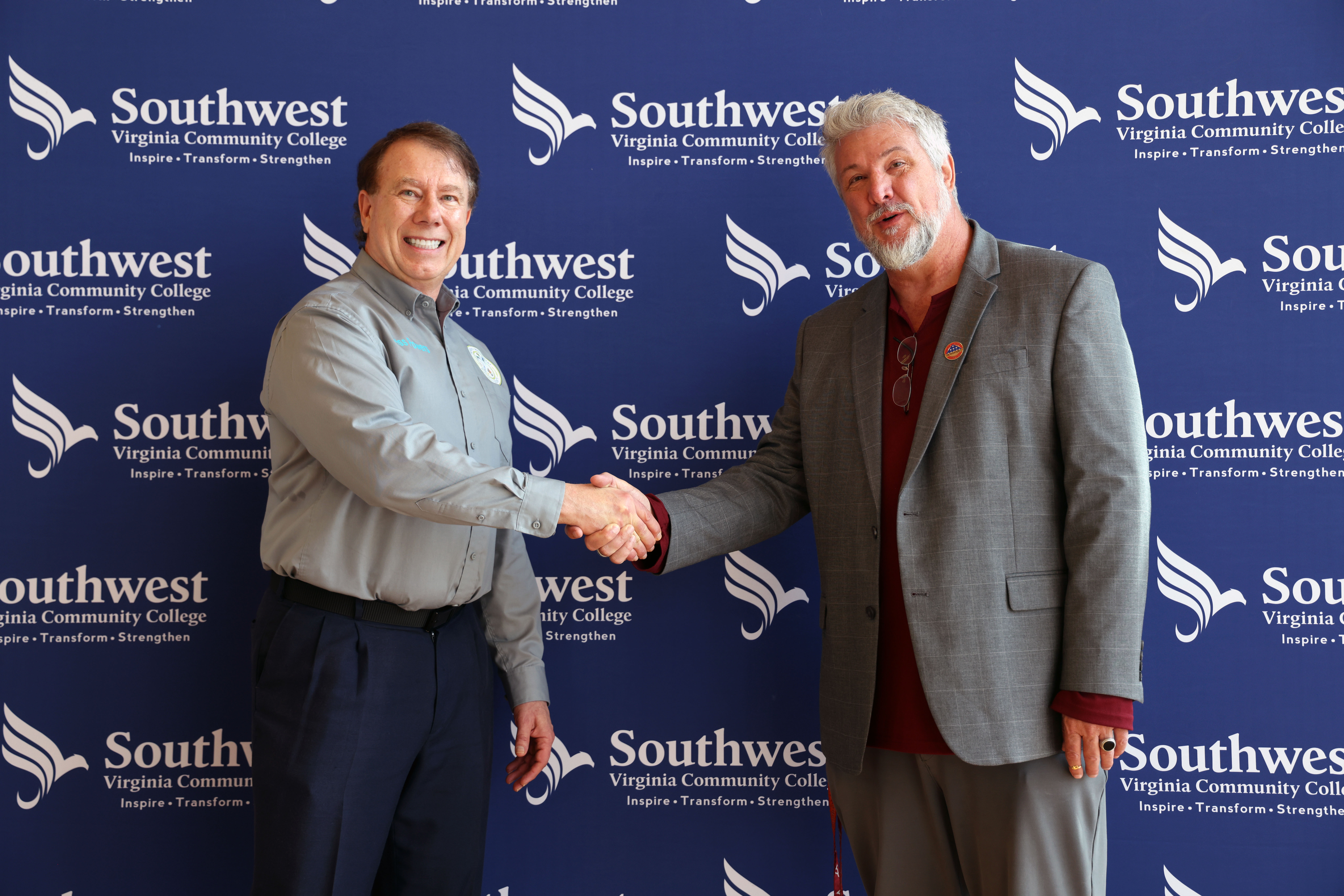 Jess Powers, Russell County Emergency Management and Hazmat Coordinator shaking hands with Dr. Brian Wright, Dean of Arts & Sciences