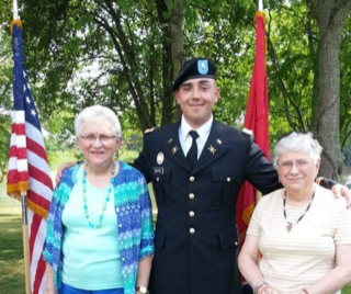 The late Col. Sandy Whitt (left) and Mary Sue Whitt (right), with 2nd Lt. Luke Creppel, a close family friend.