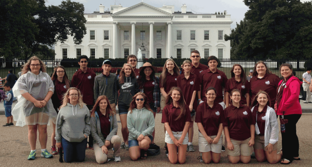 Group of students standing in front of The White House