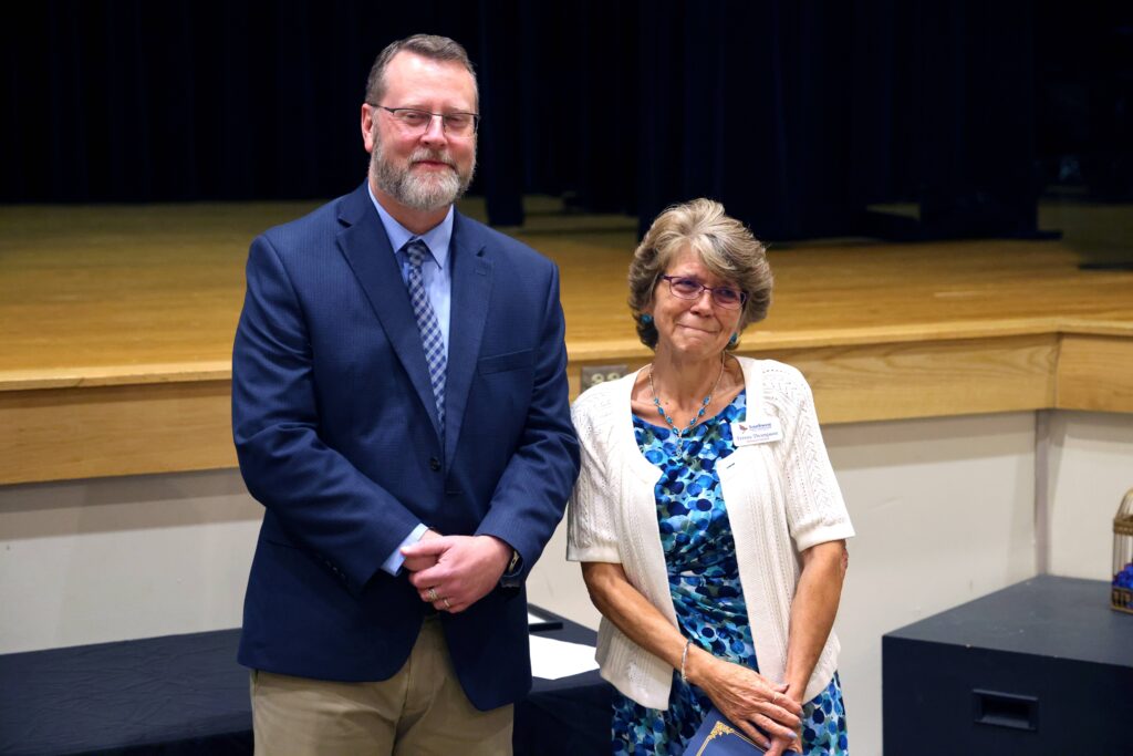 Teresa Thompson with Dr. Hayes being recognized for 40 years of service