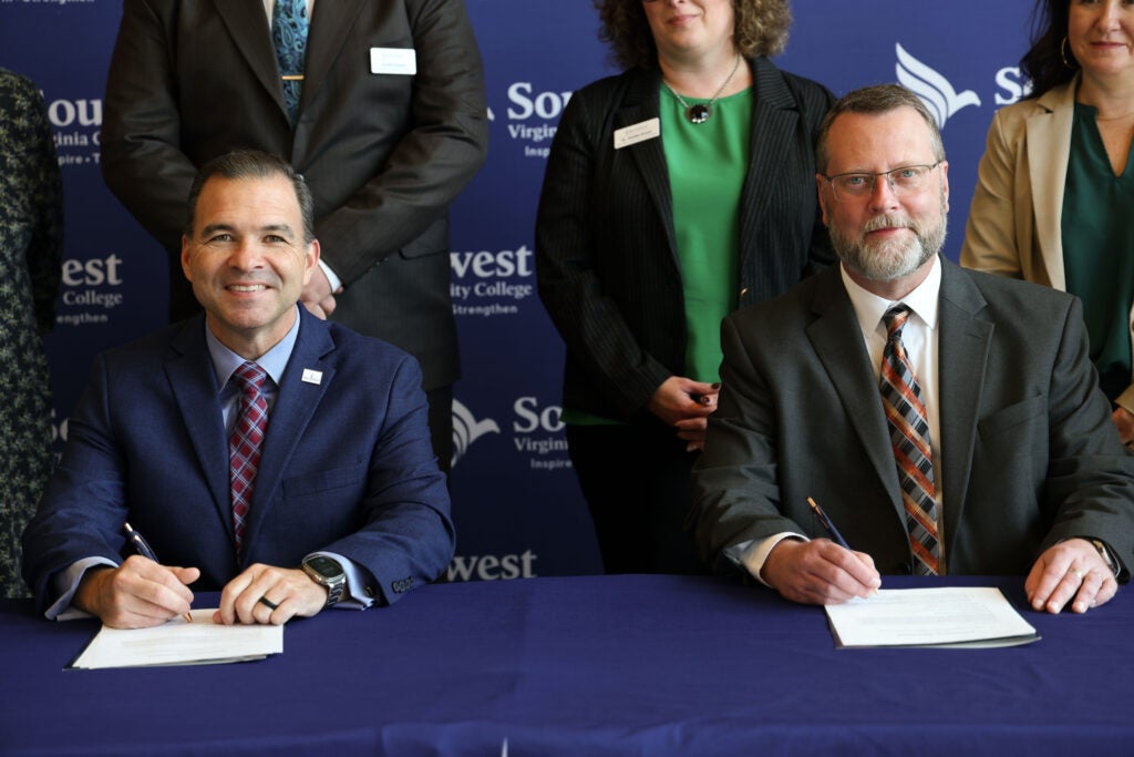 President Hayes and President Stevenson signing papers