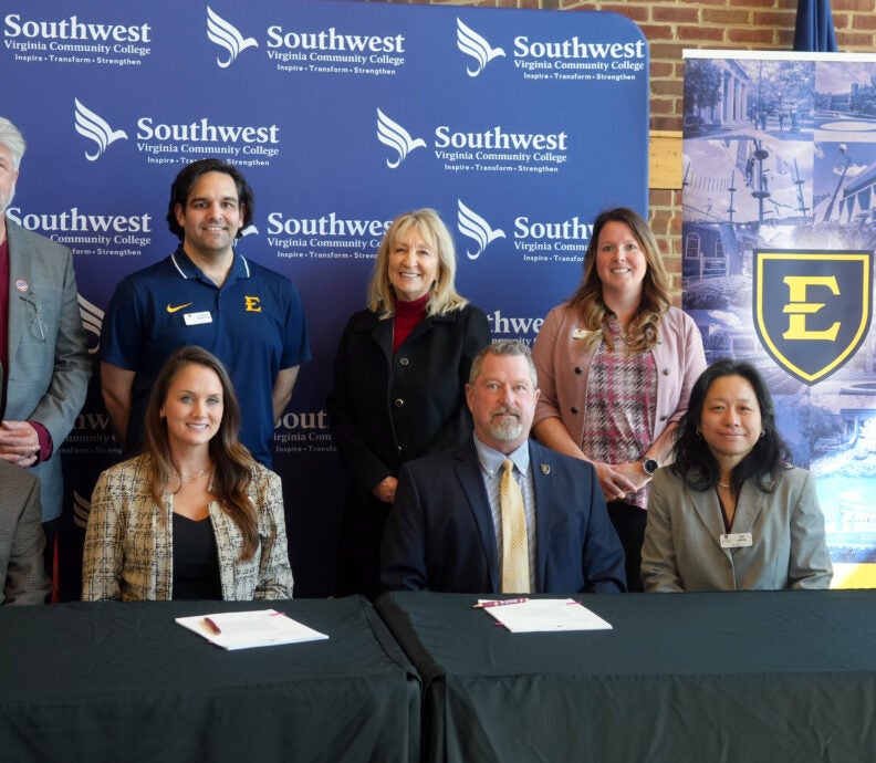 Group photo. Standing (L-R): Dr. Brian Wright, Dean of Arts and Sciences Brandon Pennington, Assistant Director of Transfer and Recruitment (2009 SWCC Alumni) Dr. Susie Mullins, Transfer Specialist Whitney Marlow, Director of Transfer and Adult Student Outreach. Seated (L-R): James Dye, Dean of Business, Engineering, and Industrial Technology Dr. Bethany Rose, Vice President of Academics and Student Services Dr. Bill Flora, Associate Provost for Curriculum Dr. Tao Huang, Chair of Art and Design Morgan Gilbert, Associate Professor and Chair of Fine Arts