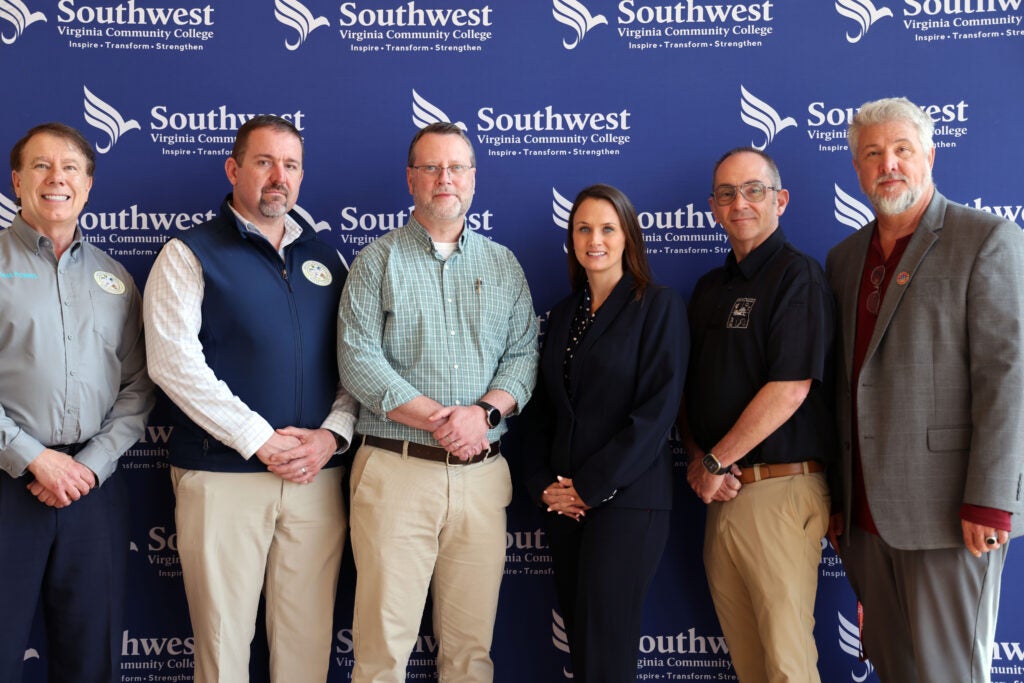 Standing (l-R) Jess Powers, Russell County Emergency Management and Hazmat Coordinator, Jared Glass, Russell County Emergency Management Coordinator, Dr. Clint Hayes, President of Southwest Virginia Community College, Dr. Bethany Rose, VP of Academic & Student Services, Jerry Stinson, Program Advisor, Dr. Brian Wright, Dean of Arts & Sciences