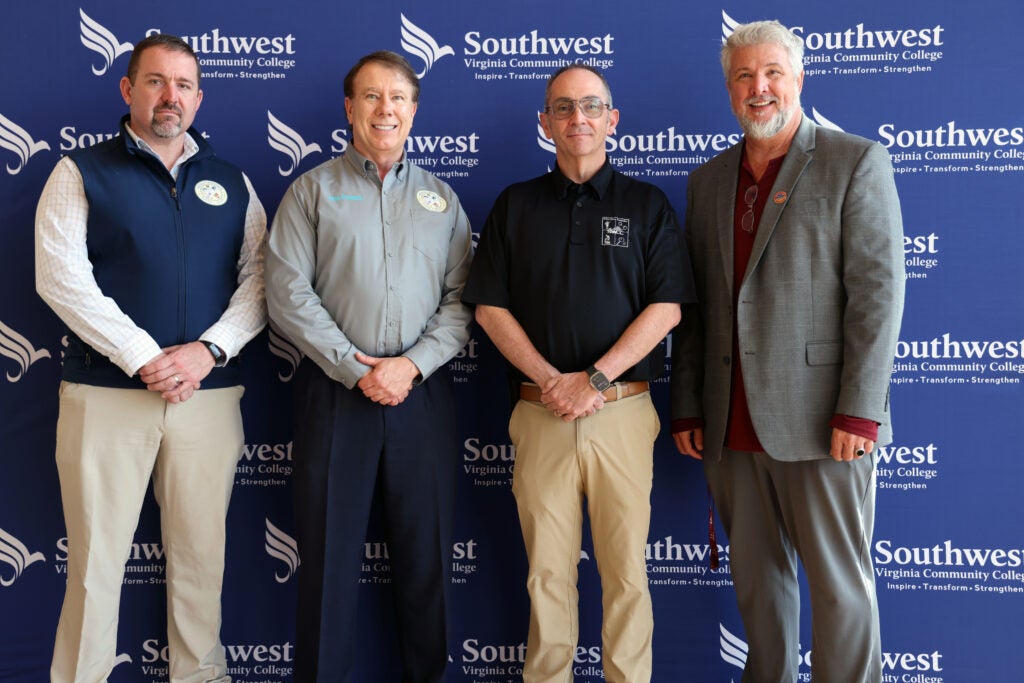 Standing (l-R) Jared Glass, Russell County Emergency Management Coordinator, Jess Powers, Russell County Emergency Management and Hazmat Coordinator, Jerry Stinson, Program Advisor, Dr. Brian Wright, Dean of Arts & Sciences