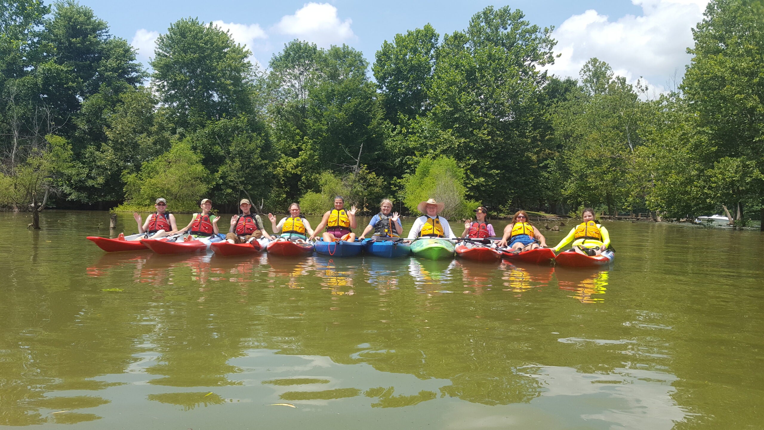 Kayak class on a calm river.
