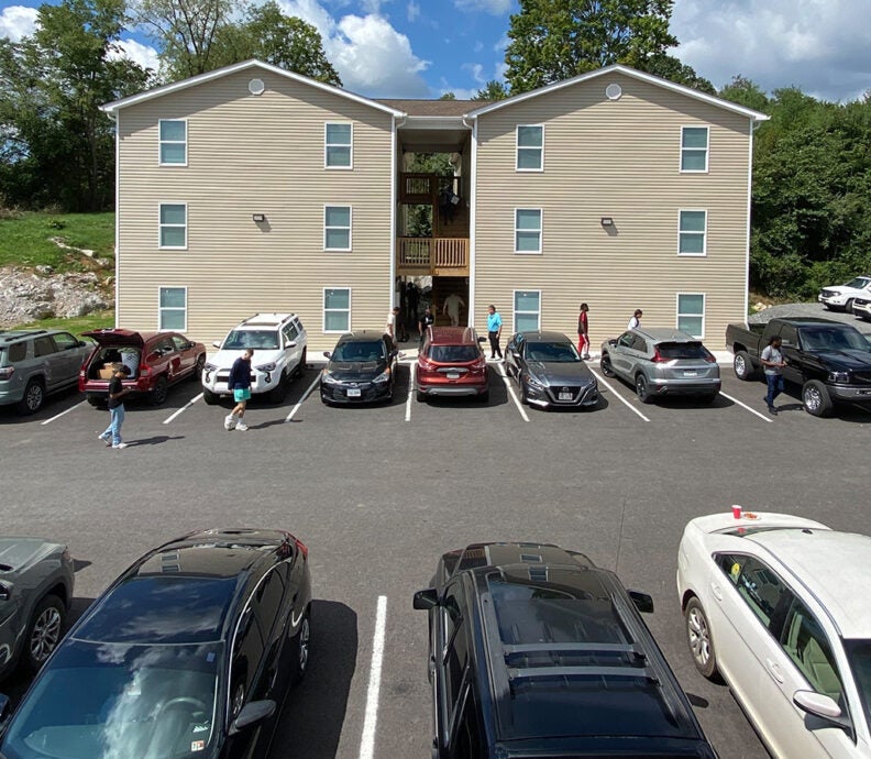 Full parking lot as students move into housing units